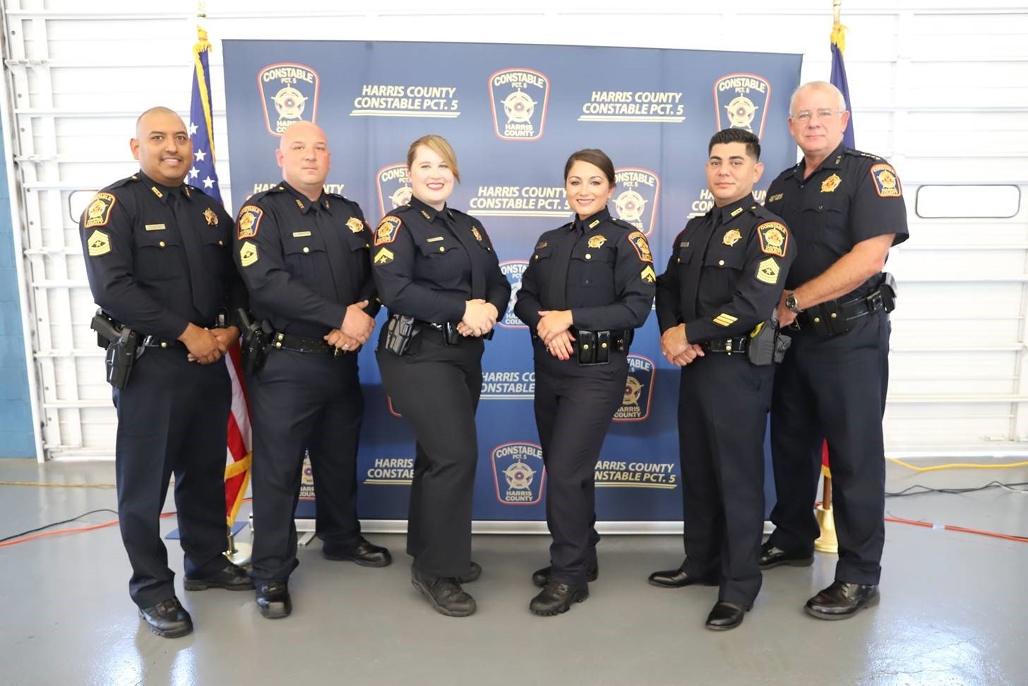 (From left to right) Deputies Frank Salas, Bobby Ferguson, Kayla Fesperman, Courtney Reyes and Robert Felix all received promotions for their work in Harris County Constable for Precinct 5 Ted Heap’s (far right) office.
